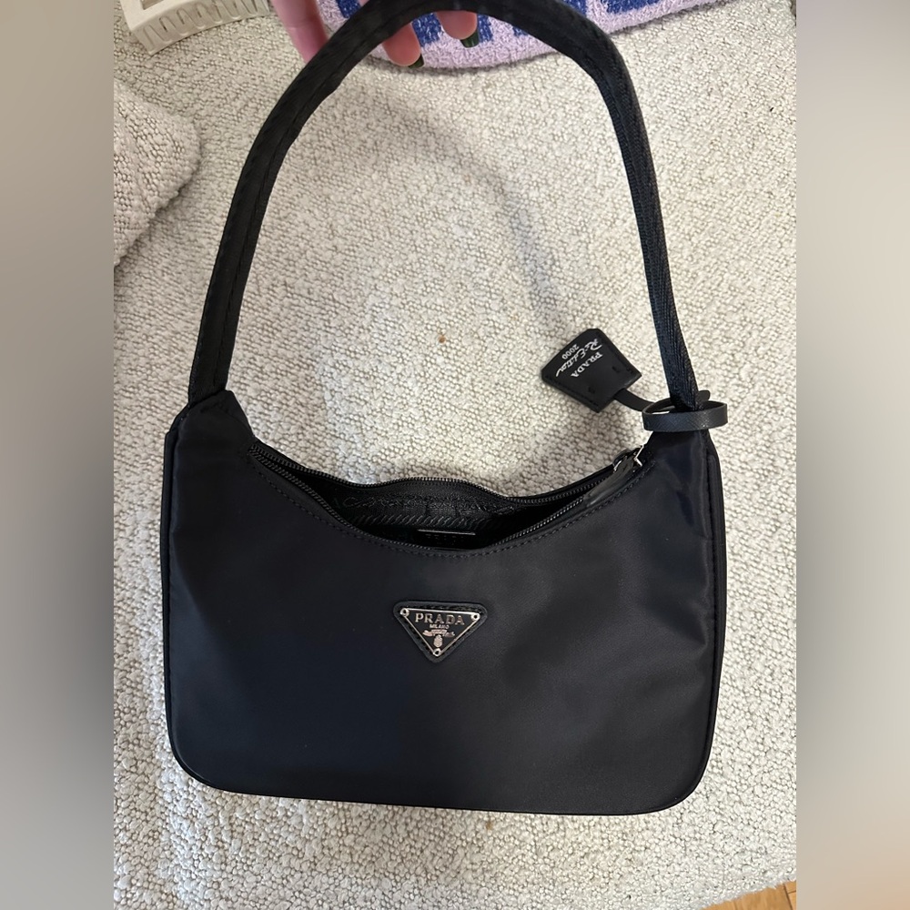 Black little bag not Prada ok condition